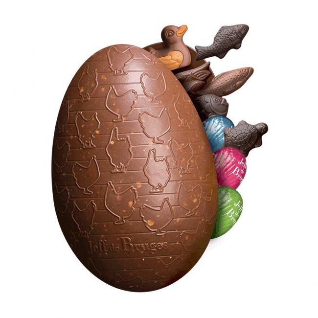 Oeuf croustillant 13 cm en chocolat au lait garni. sans personnalisation