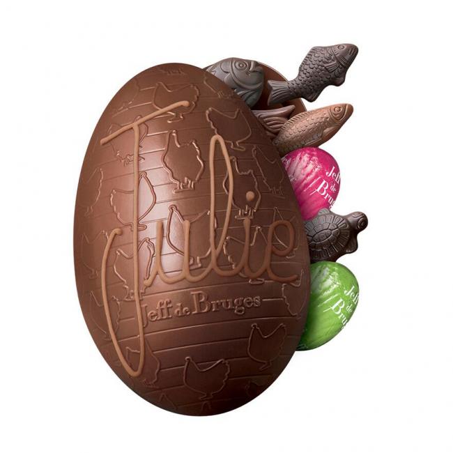 Oeuf 10 cm en chocolat au lait garni avec personnalisation