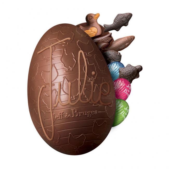 Oeuf 13 cm en chocolat au lait garni avec personnalisation