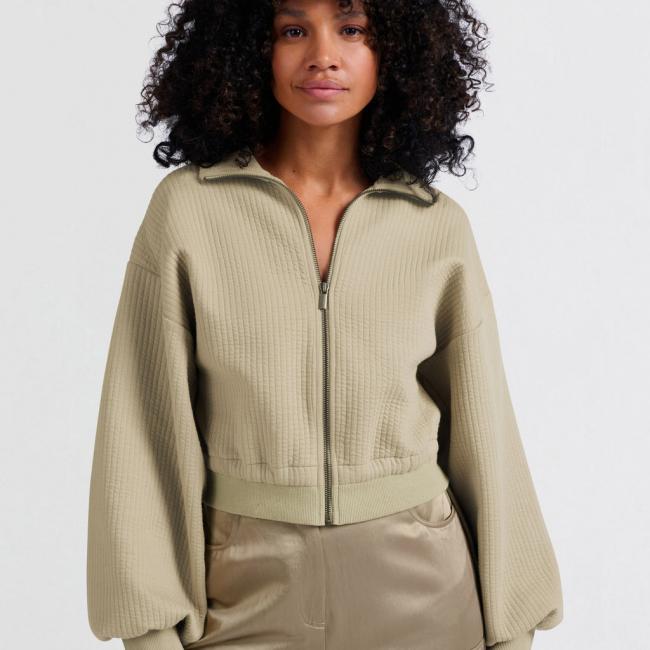 Cardigan en jersey côtelé avec cordons et fermeture éclair