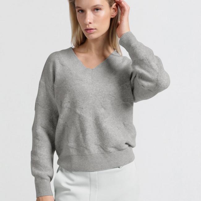 Pull à col en V et motif texturé