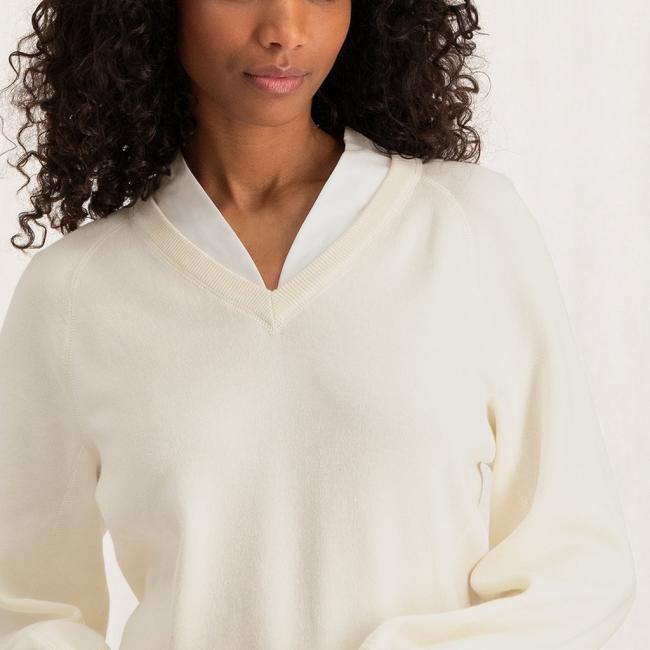 Pull col V, manches longues ballon et coutures apparentes