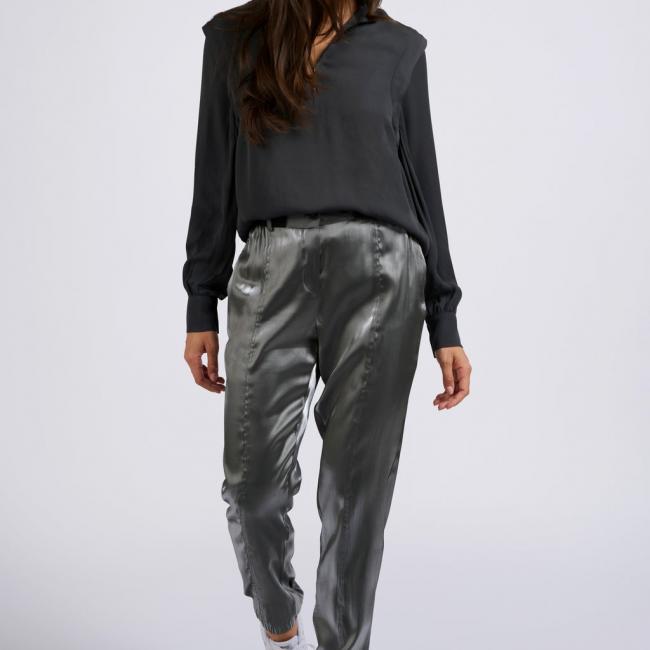 Pantalon argenté métallisé, ceinture élastiquée et poches