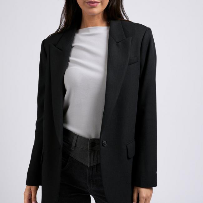 Blazer oversize, manches longues à poches et bouton unique