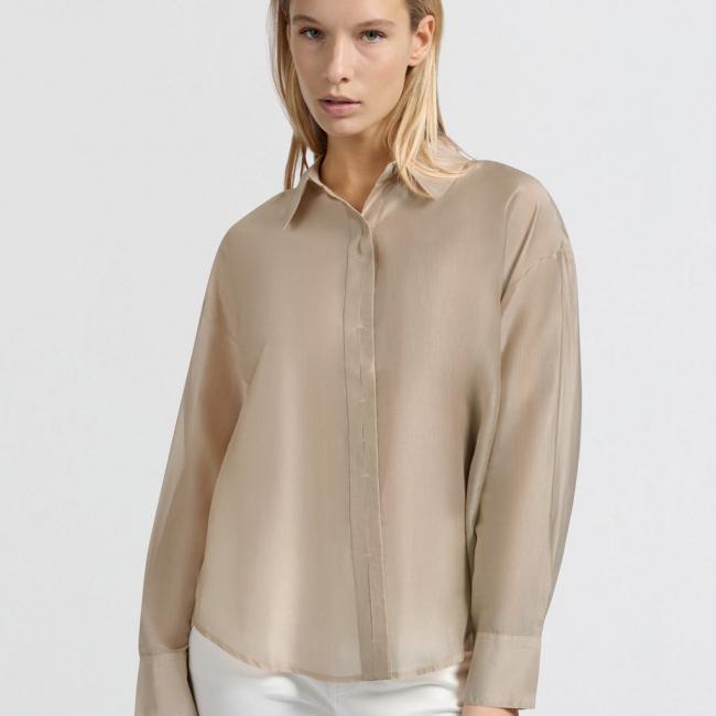 Blouse avec patte de boutonnage dissimulée et coupe ample