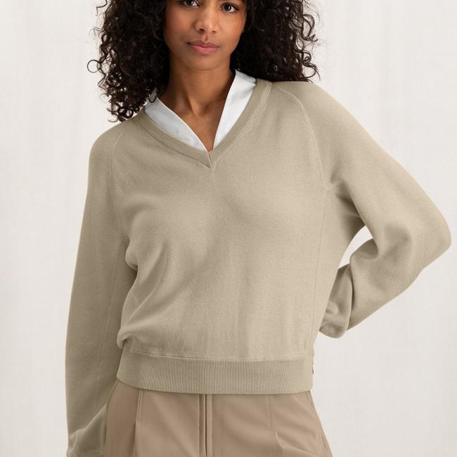 Pull col V, manches longues ballon et coutures apparentes