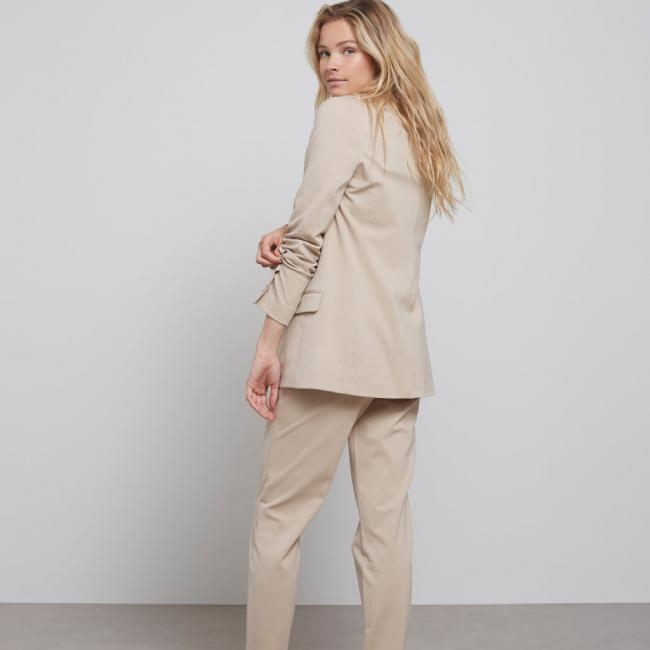 Blazer en jersey manches longues avec poche, couleur neutre